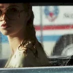 Photo du film : La Dame dans l'auto avec des lunettes et un fusil